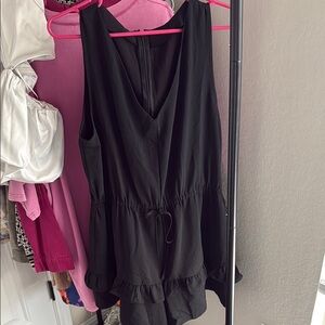 Black Sleeveless Ruffle Hem Romper